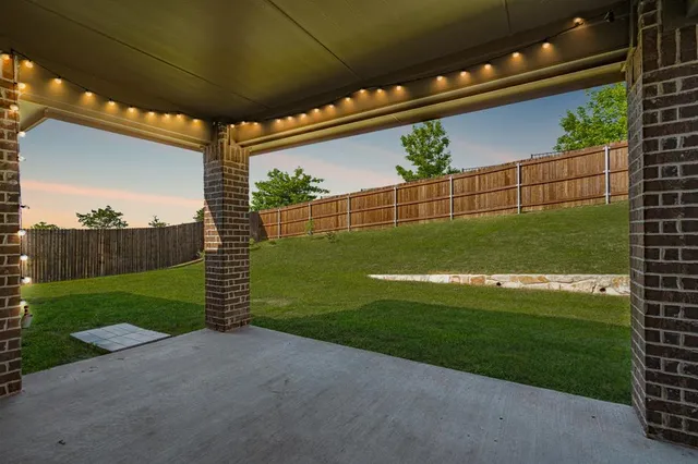 a en suite bathroom with double sink and a mirror