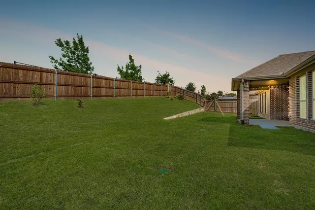 a view of a golf course with a garden