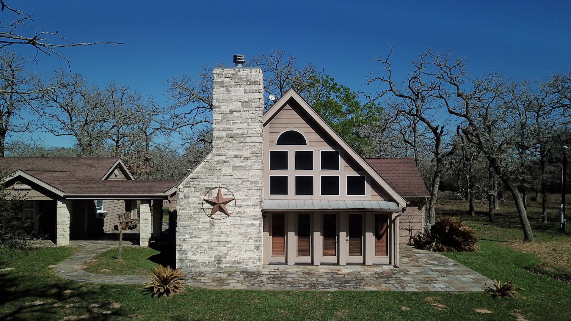 3337 Brunes Mill Road Columbus, TX 78934 - Photo 48 of 48 a front view of a house with garden