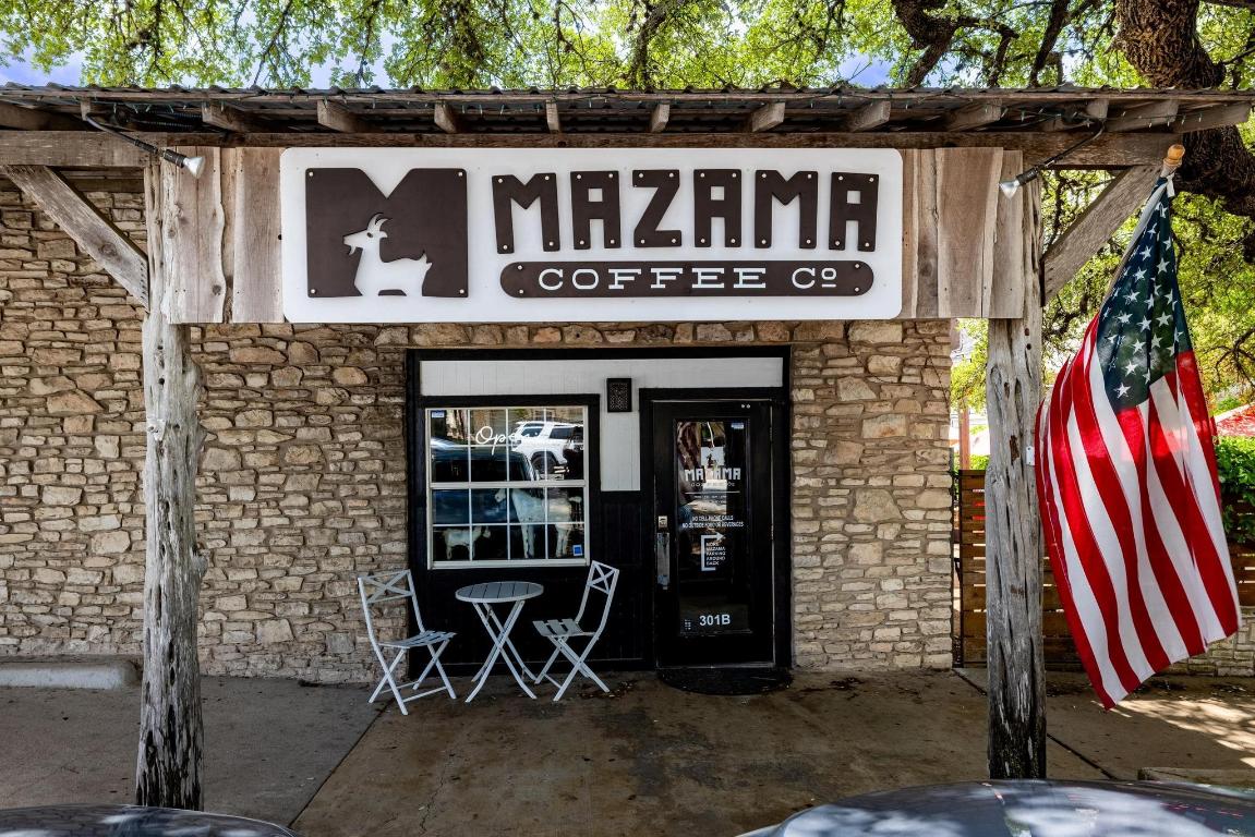 320 Creek Road, Unit 302 Dripping Springs, TX 78620 - Photo 14 of 21 Entrance to property featuring stone siding