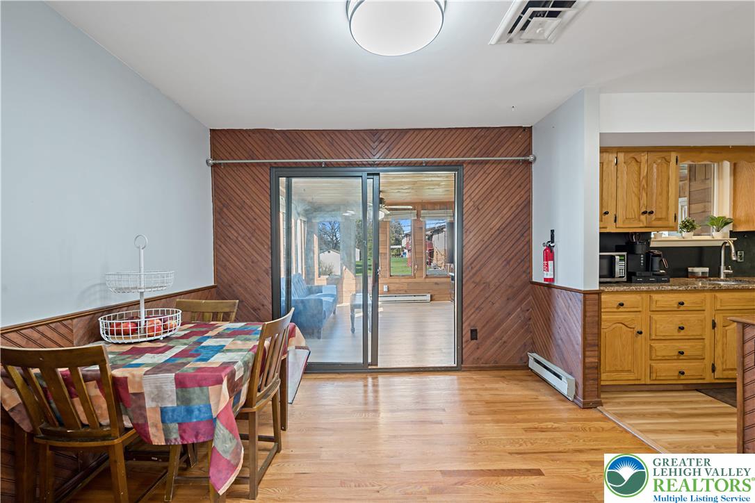 3945 Hemlock Place Bethlehem, PA 18017 - Photo 19 of 46 a bedroom with a bed and wooden floor