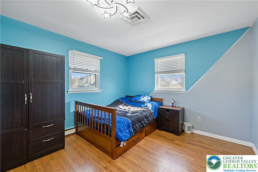 3945 Hemlock Place Bethlehem, PA 18017 - Photo 29 of 46 a bedroom with a bed and a window