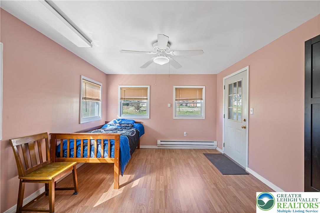 3945 Hemlock Place Bethlehem, PA 18017 - Photo 38 of 46 a view of a bedroom with wooden floor & a ceiling fan