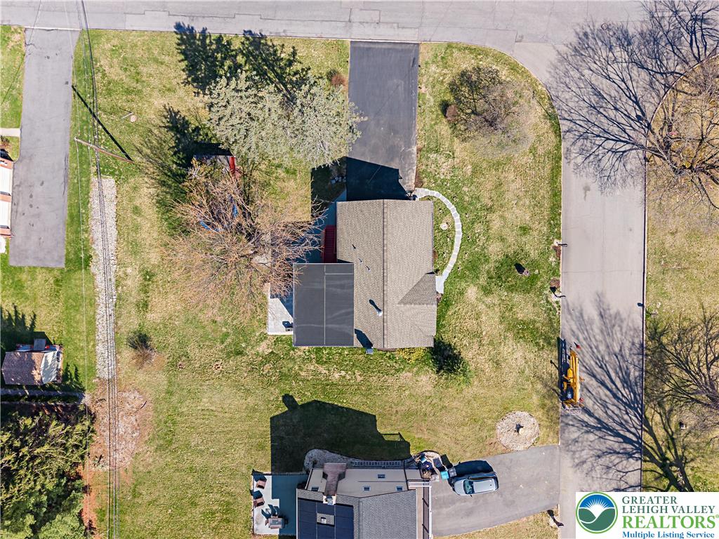 3945 Hemlock Place Bethlehem, PA 18017 - Photo 9 of 46 an aerial view of a house with yard swimming pool and outdoor seating