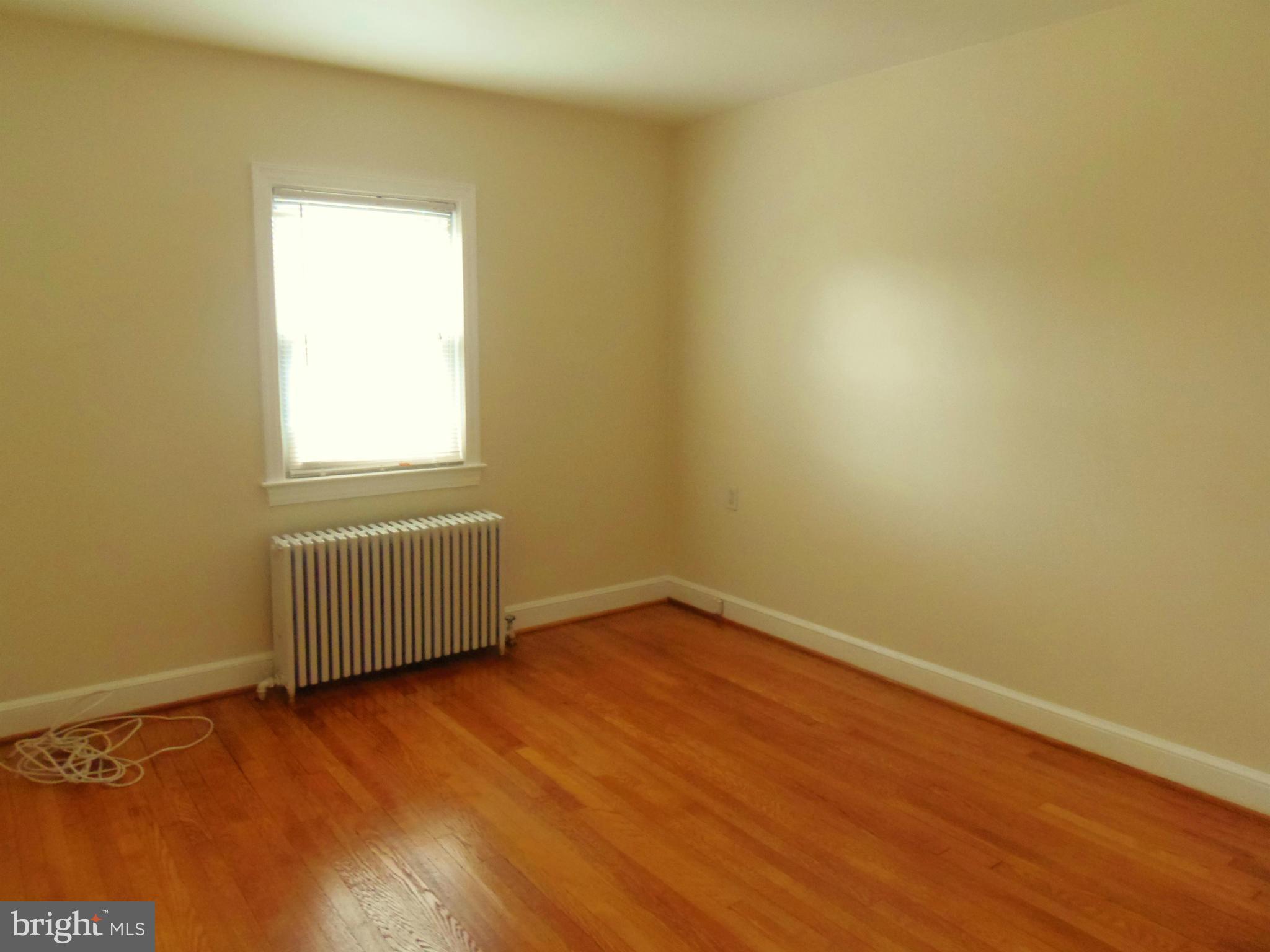 2105 Brighton Road Hyattsville, MD 20782 - Photo 12 of 25 an empty room with a window