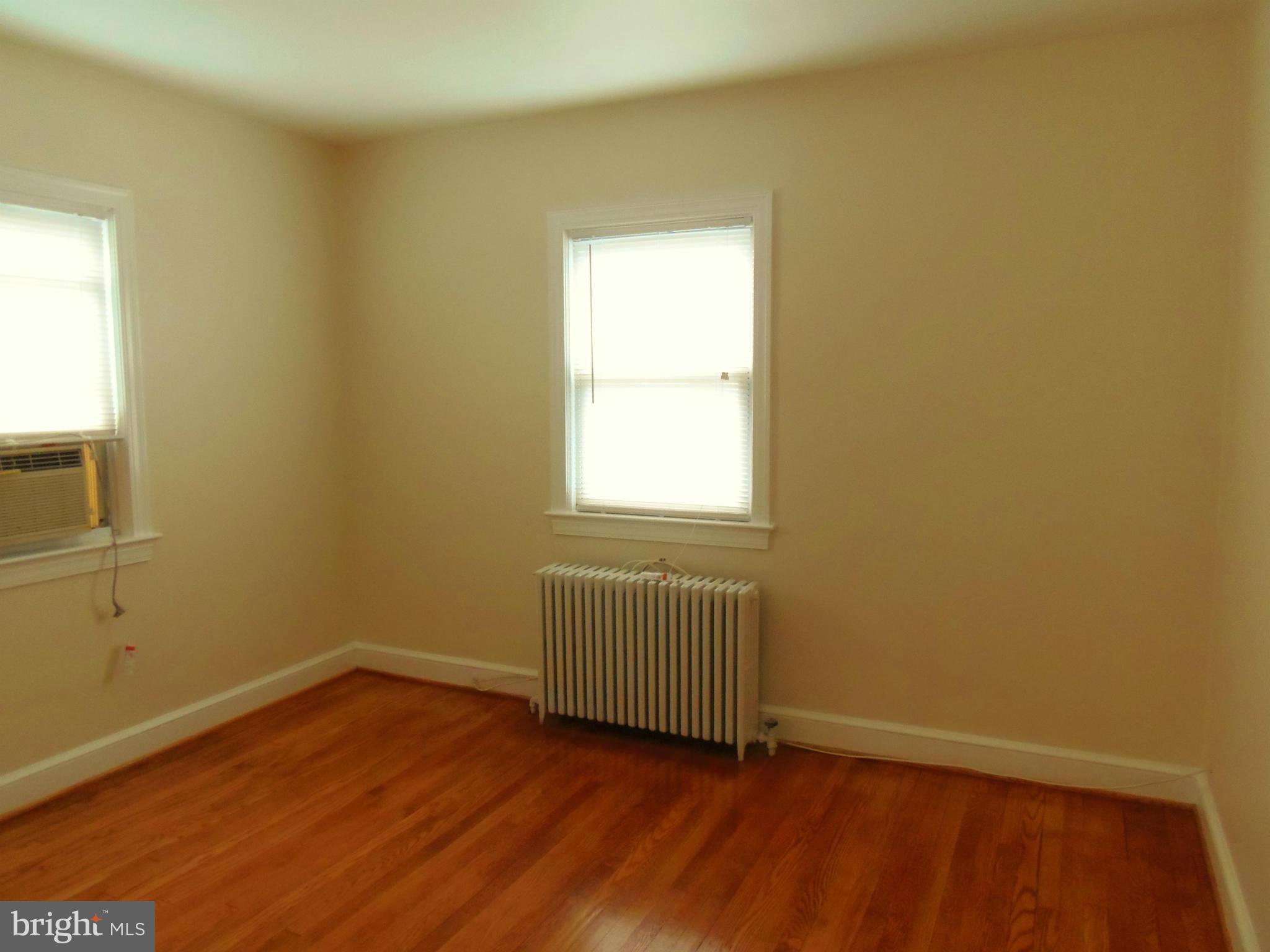 2105 Brighton Road Hyattsville, MD 20782 - Photo 13 of 25 an empty room with a window