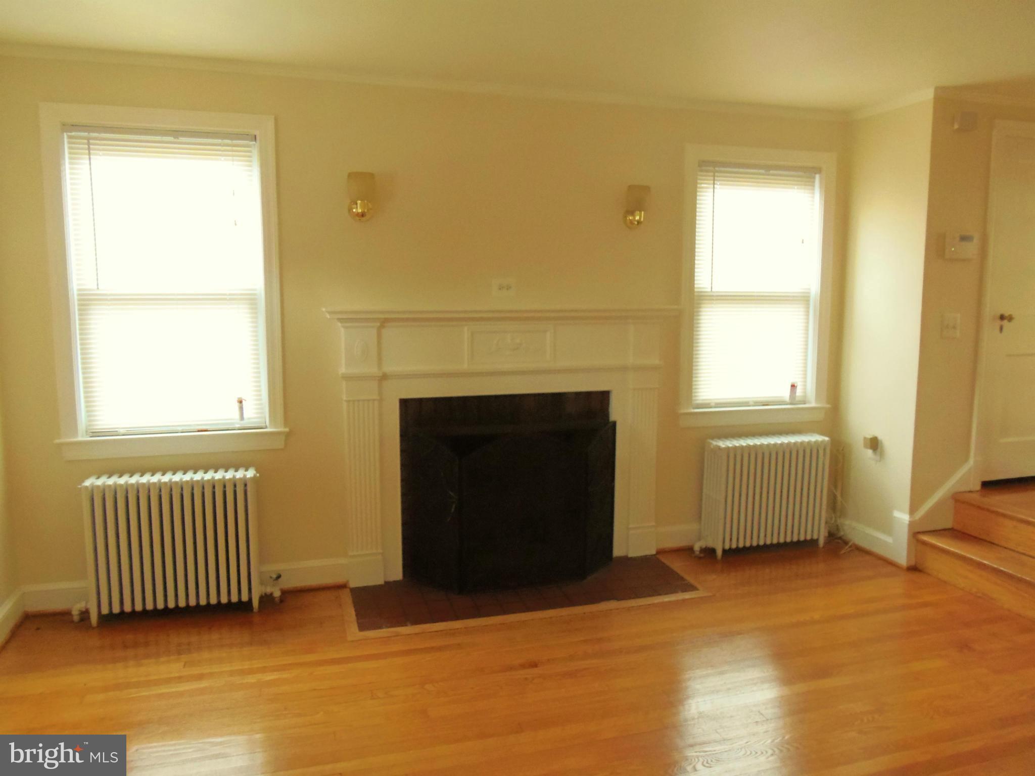 2105 Brighton Road Hyattsville, MD 20782 - Photo 3 of 25 a view of an empty room with a window