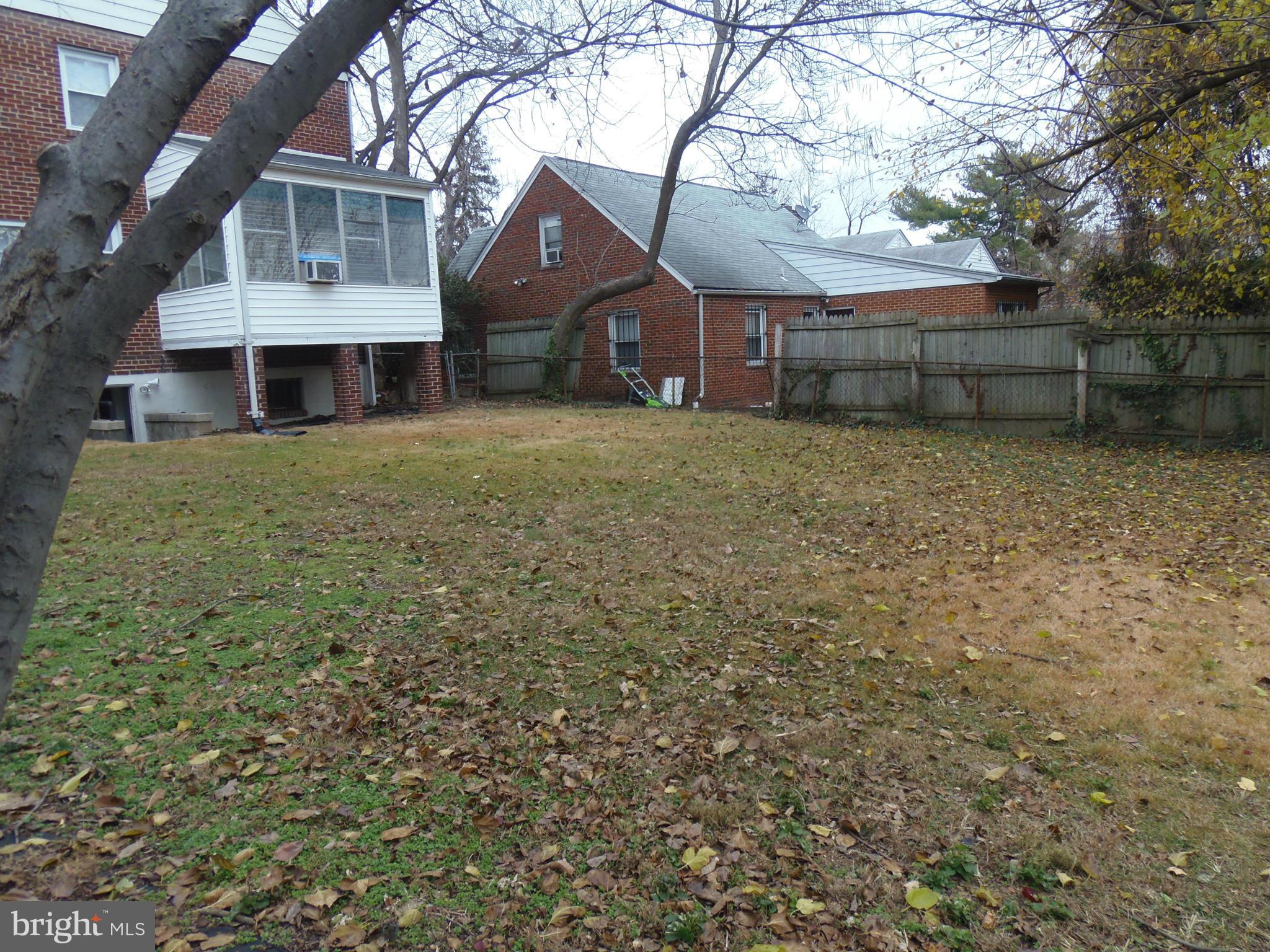 2105 Brighton Road Hyattsville, MD 20782 - Photo 22 of 25 a front view of a house with a garden