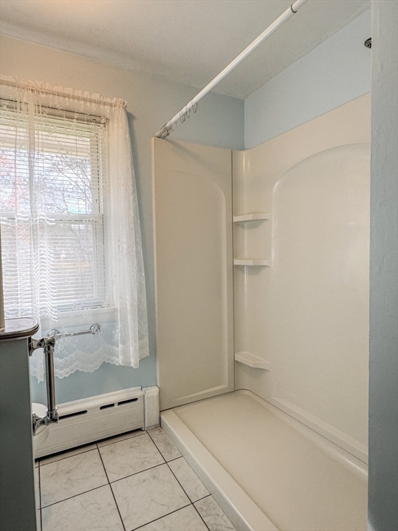 74 Petty Plain Road Greenfield, MA 01301 - Photo 17 of 42 a view of an empty room with a glass door