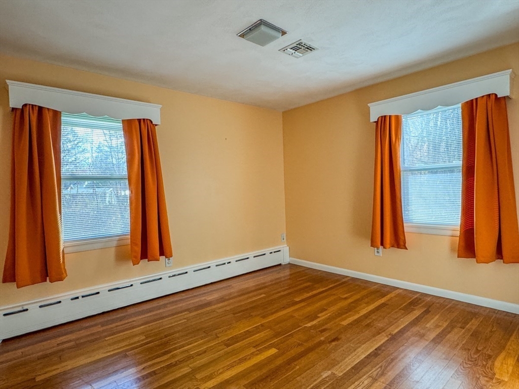 74 Petty Plain Road Greenfield, MA 01301 - Photo 18 of 42 a view of a room with wooden floor and a window