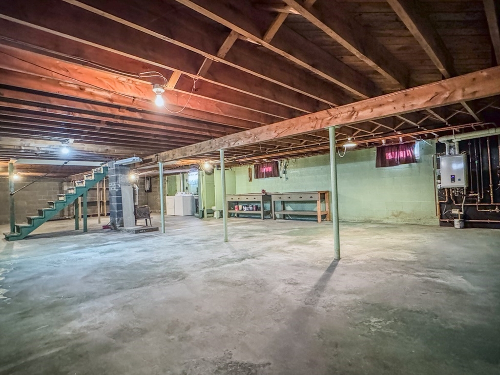 74 Petty Plain Road Greenfield, MA 01301 - Photo 25 of 42 a view of empty room with wooden ceiling