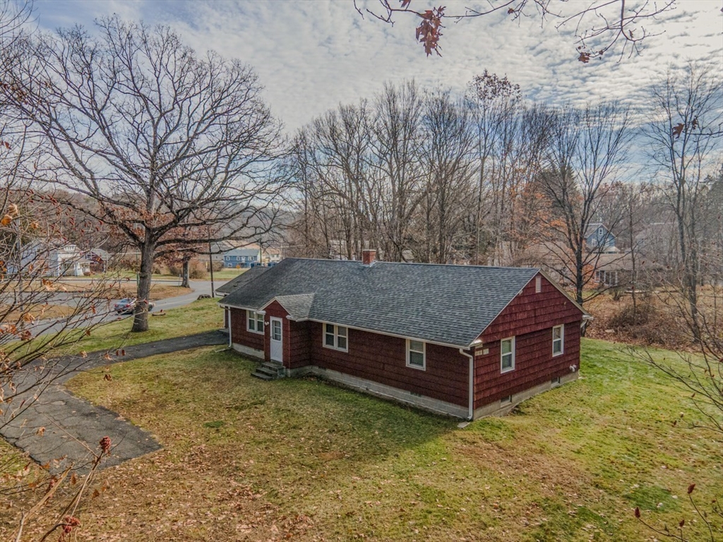 74 Petty Plain Road Greenfield, MA 01301 - Photo 39 of 42 a view of a barn in the middle of a yard