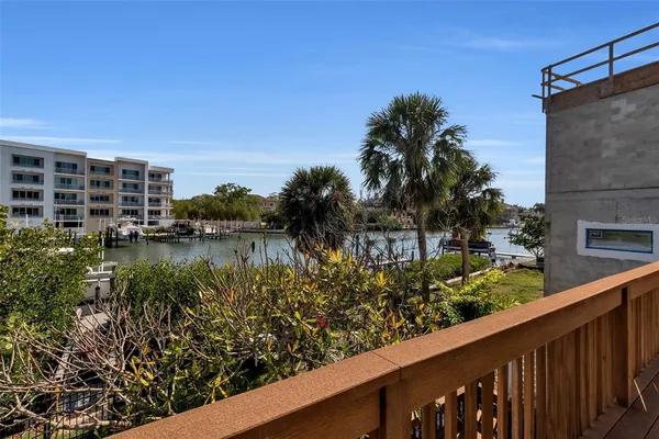a view of a lake from a balcony