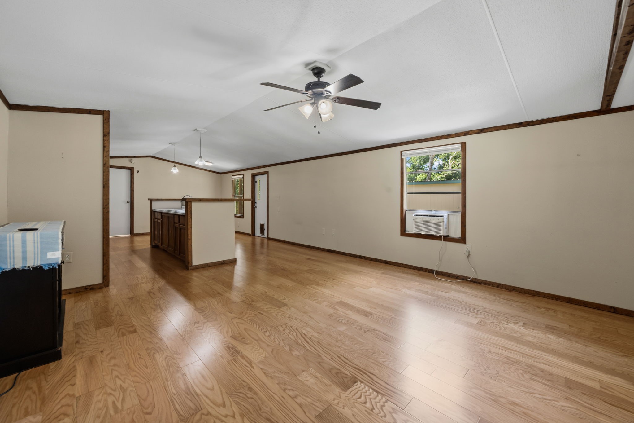 30 East Old Field Road Huffman, TX 77336 - Photo 9 of 31 Step inside to discover freshly painted interiors complemented by beautiful brand-new wood flooring that flows throughout the home, creating a bright, welcoming space that's move-in ready.