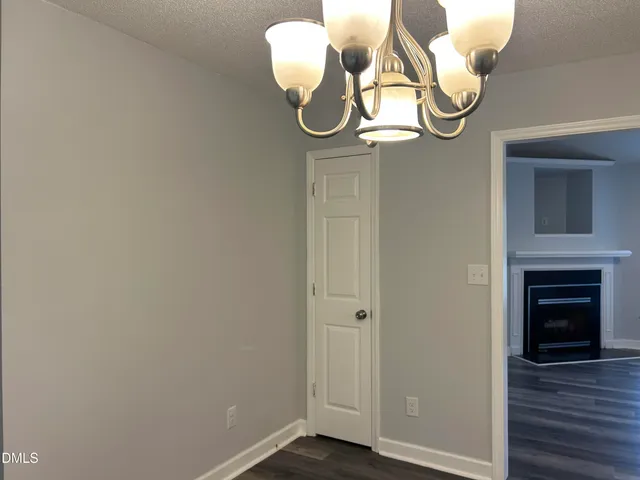 a picture of a mirror with wooden floor