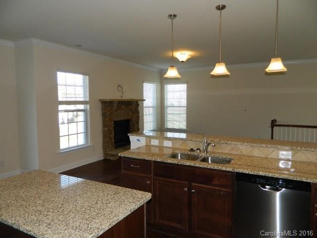 723 Falcon Ridge, Unit HKC 110 Fort Mill, SC 29708 - Photo 2 of 7 a kitchen with sink and window