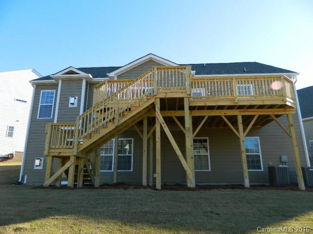 723 Falcon Ridge, Unit HKC 110 Fort Mill, SC 29708 - Photo 7 of 7 a view of front of house with a yard