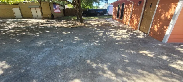 a backyard of a house with lots of green space