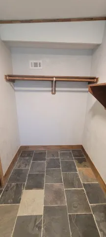 a view of a room with an empty space