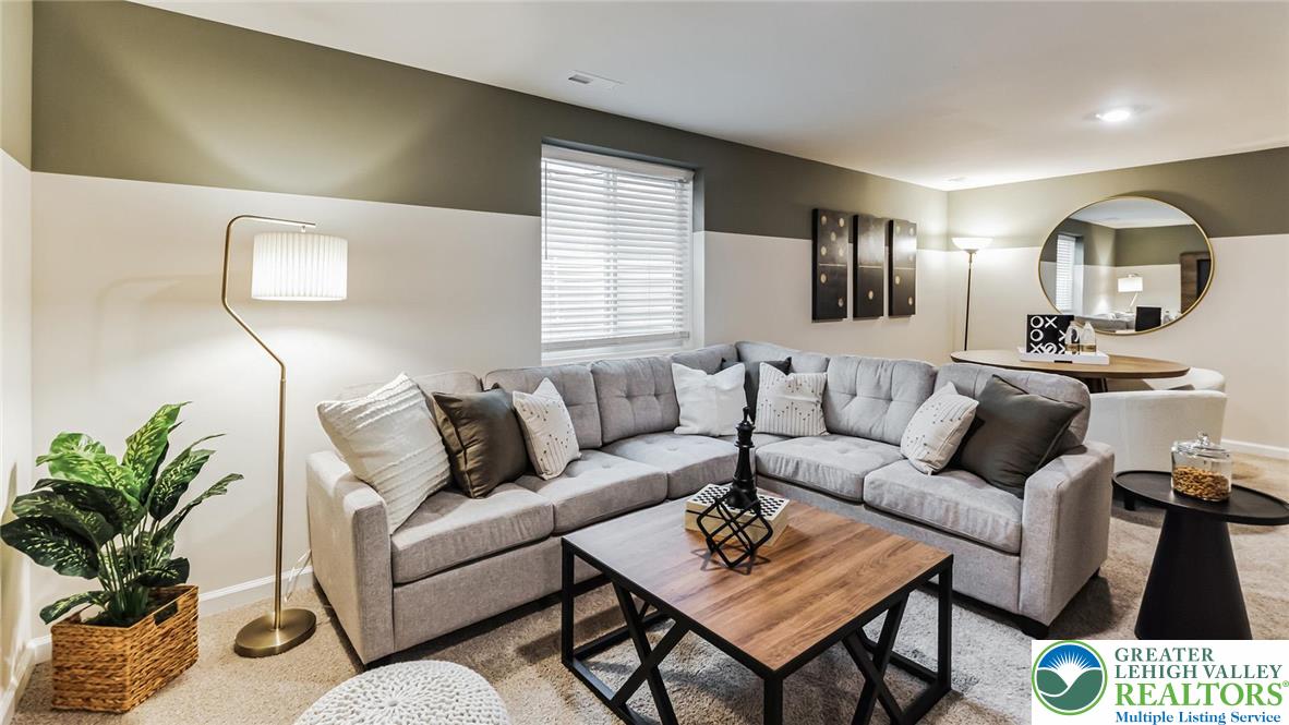 113 Winding Road Easton, PA 18040 - Photo 27 of 29 a living room with furniture and wooden floor