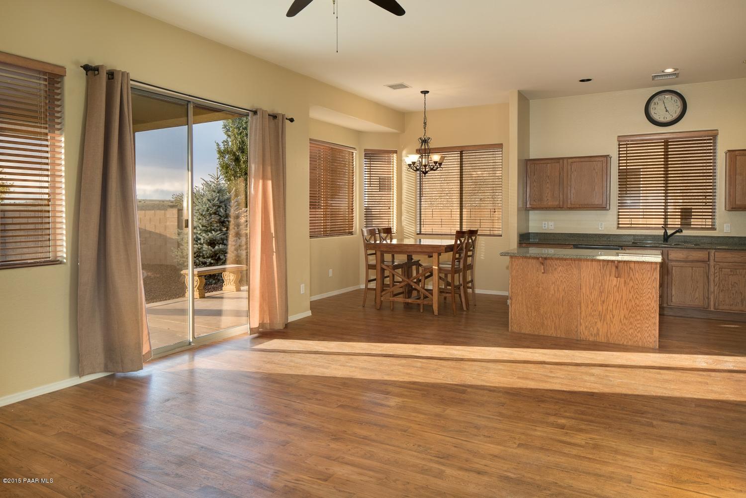 4752 Edgemont Road Prescott Valley, AZ 86314 - Photo 6 of 16 a view of a livingroom with furniture window and wooden floor