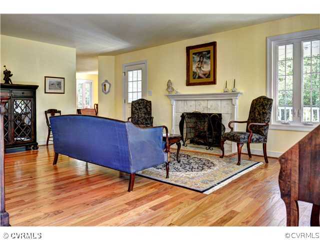 9980 Figg Shop Road Gloucester, VA 23061 - Photo 3 of 24 Living Room - Gleaming hardwood floors and gas fir
