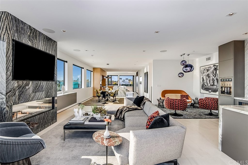 520 13th Street Manhattan Beach, CA 90266 - Photo 12 of 70 a living room with furniture and a flat screen tv