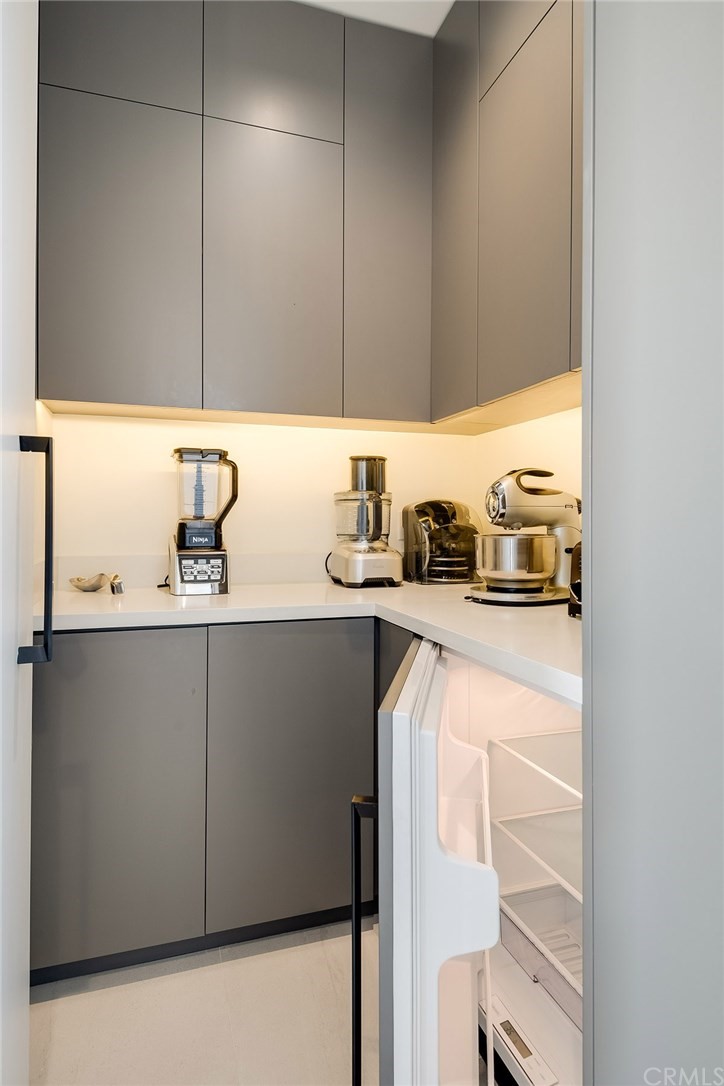 520 13th Street Manhattan Beach, CA 90266 - Photo 21 of 70 a kitchen with a sink a cabinets and appliances