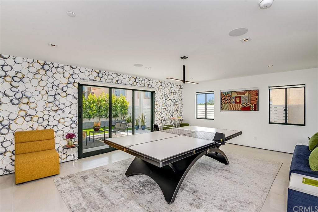 520 13th Street Manhattan Beach, CA 90266 - Photo 41 of 70 a living room with furniture and a large window
