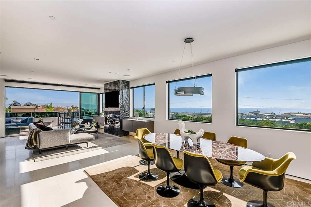 520 13th Street Manhattan Beach, CA 90266 - Photo 5 of 70 a living room with furniture potted plant and a large window