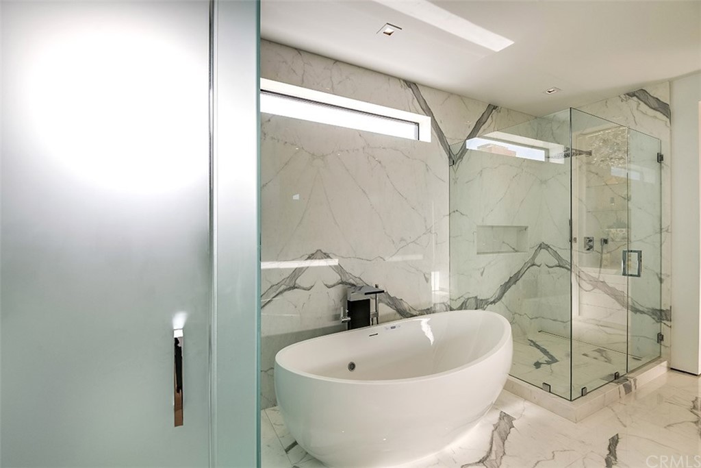 520 13th Street Manhattan Beach, CA 90266 - Photo 53 of 70 a white bath tub sitting next to a white sink