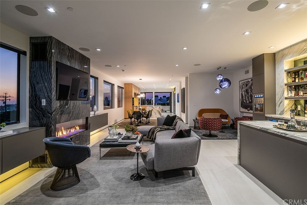 520 13th Street Manhattan Beach, CA 90266 - Photo 9 of 70 a living room with furniture and a flat screen tv
