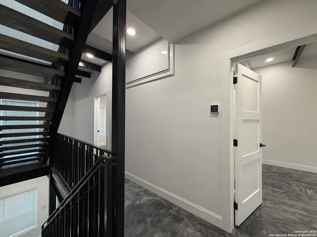 a view of a hallway with entryway