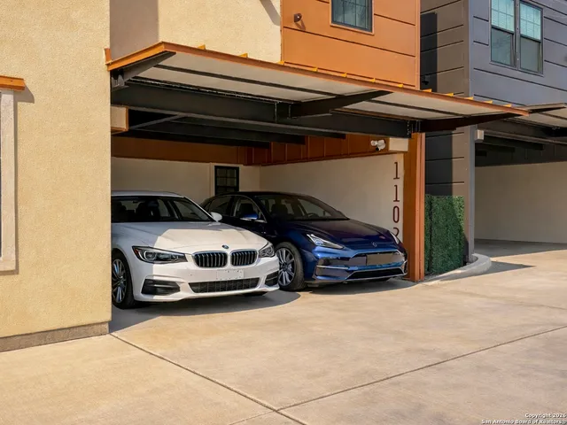 a car parked in front of a house