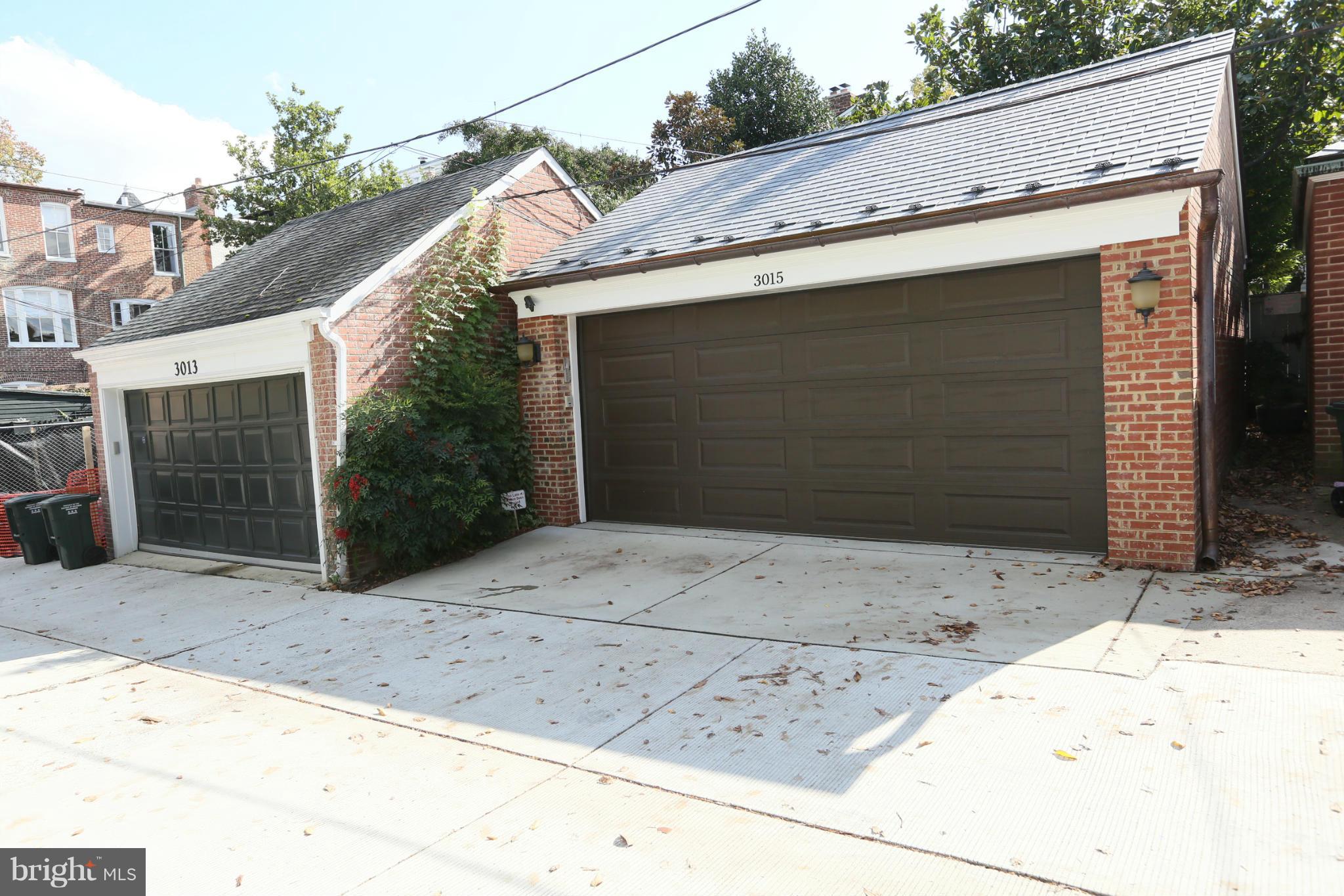 3015 P Street Northwest Washington, DC 20007 - Photo 26 of 26 3 car garage with an additional space in front.