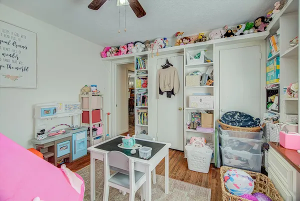 a room with furniture and a bed