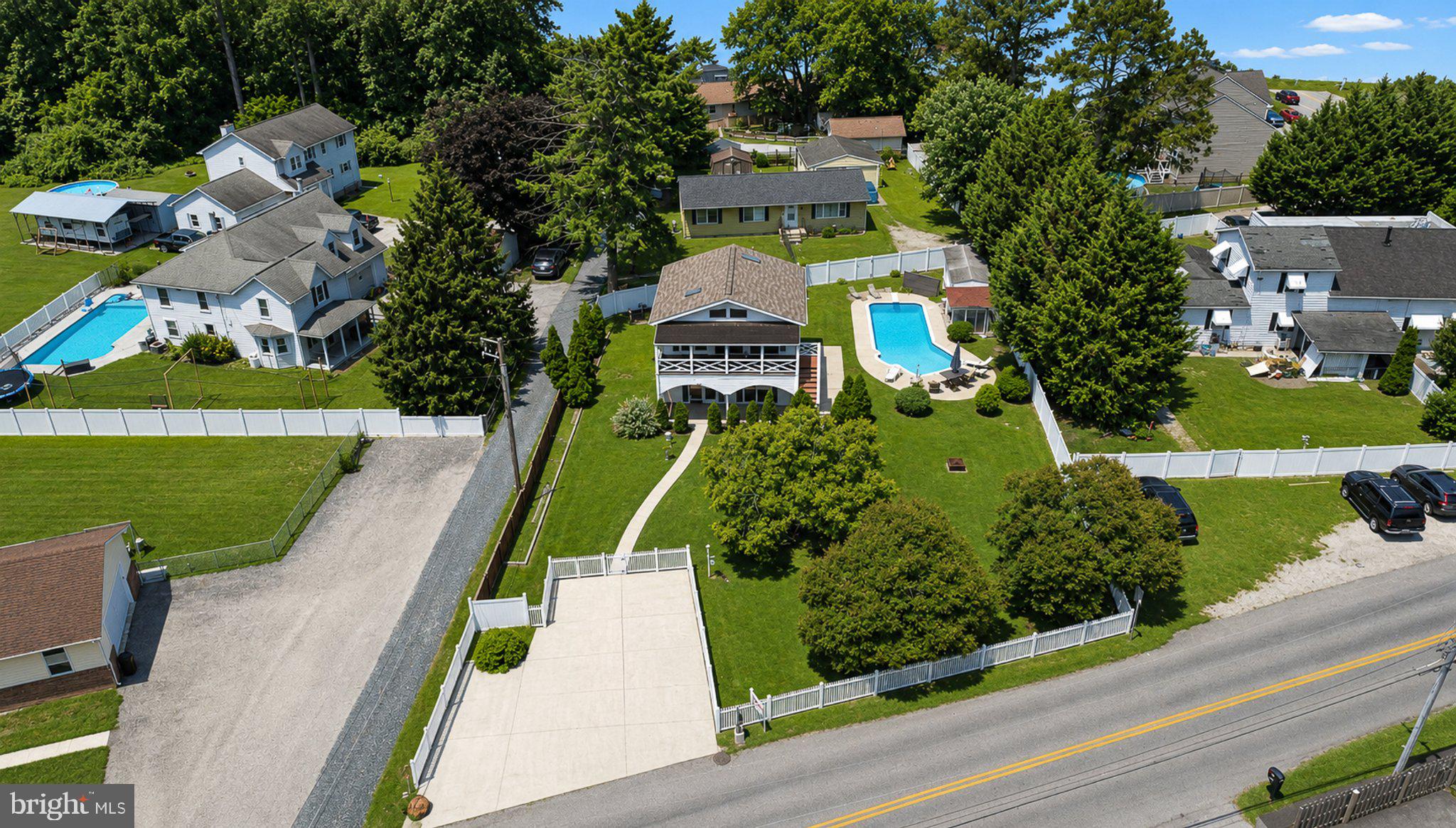 2858 Lodge Farm Road Baltimore, MD 21219 - Photo 7 of 49 Charming homes with lush greenery.