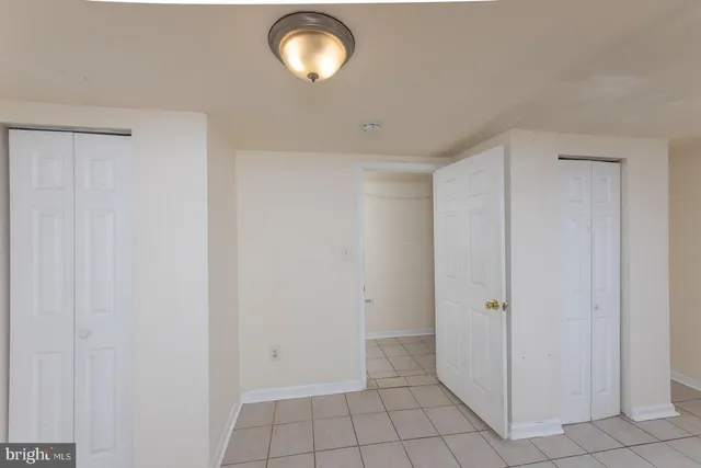 a bathroom with a toilet and a bathtub
