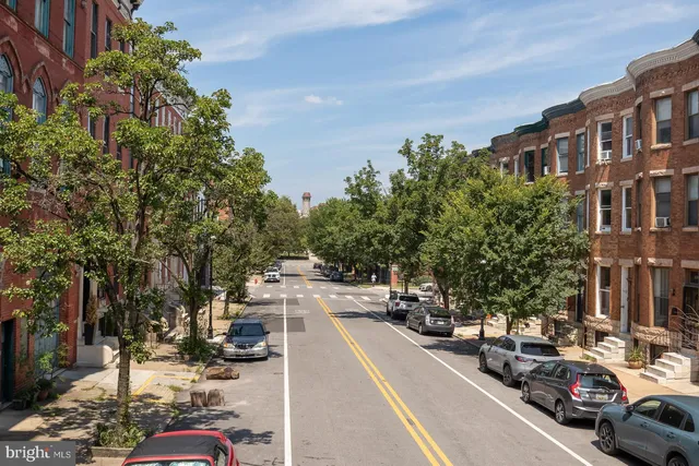 a view of a city street from a building