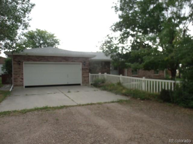 2372 Haskell Way Watkins, CO 80137 - Photo 2 of 17 a view of backyard and entertaining space