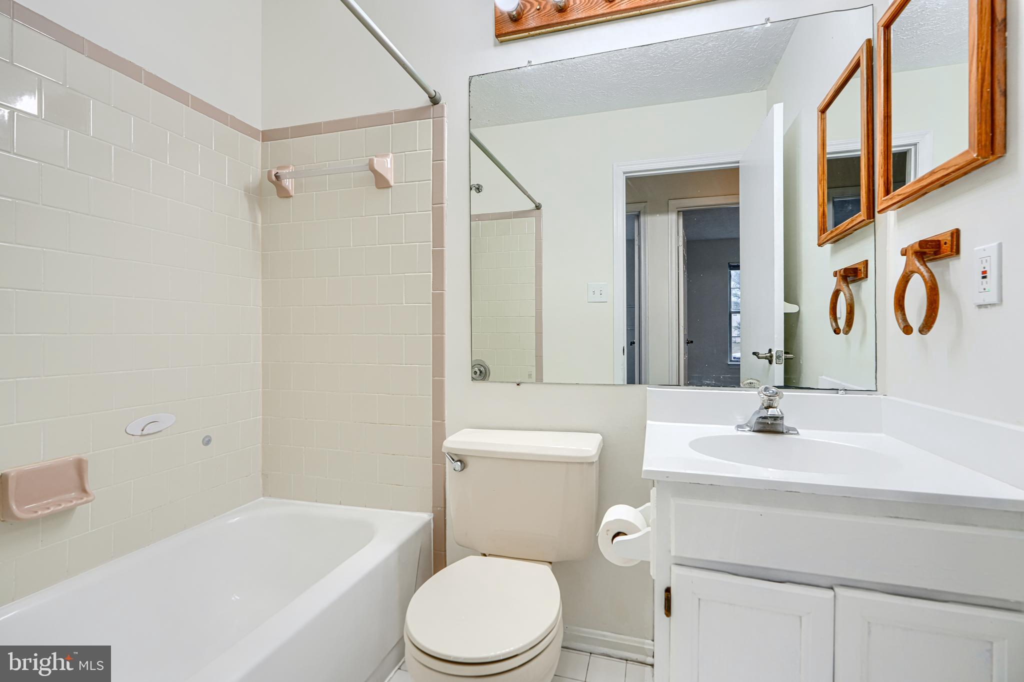 11 Offspring Court Perry Hall, MD 21128 - Photo 19 of 38 a bathroom with a sink toilet and shower