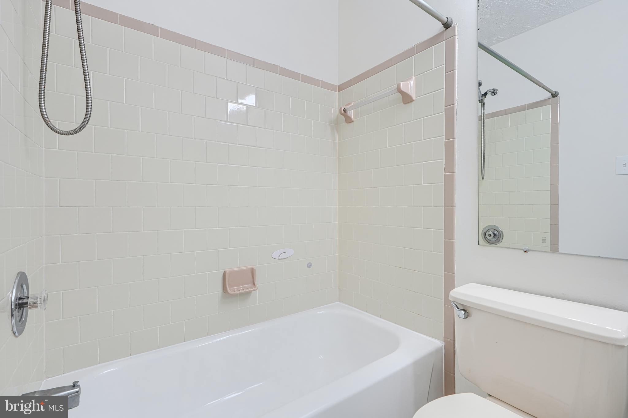 11 Offspring Court Perry Hall, MD 21128 - Photo 20 of 38 a bathroom with a bath tub and a shower