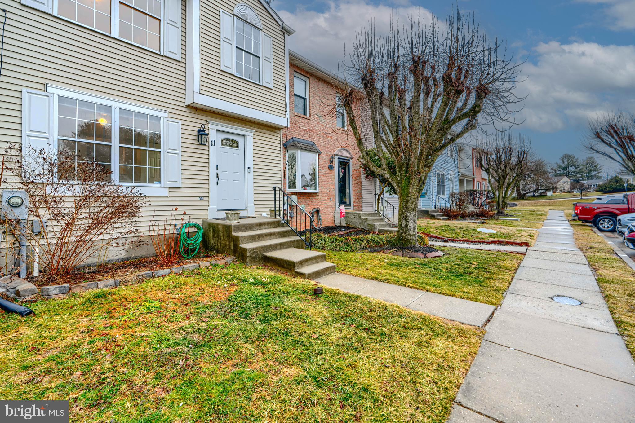 11 Offspring Court Perry Hall, MD 21128 - Photo 2 of 38 a front view of a house with garden