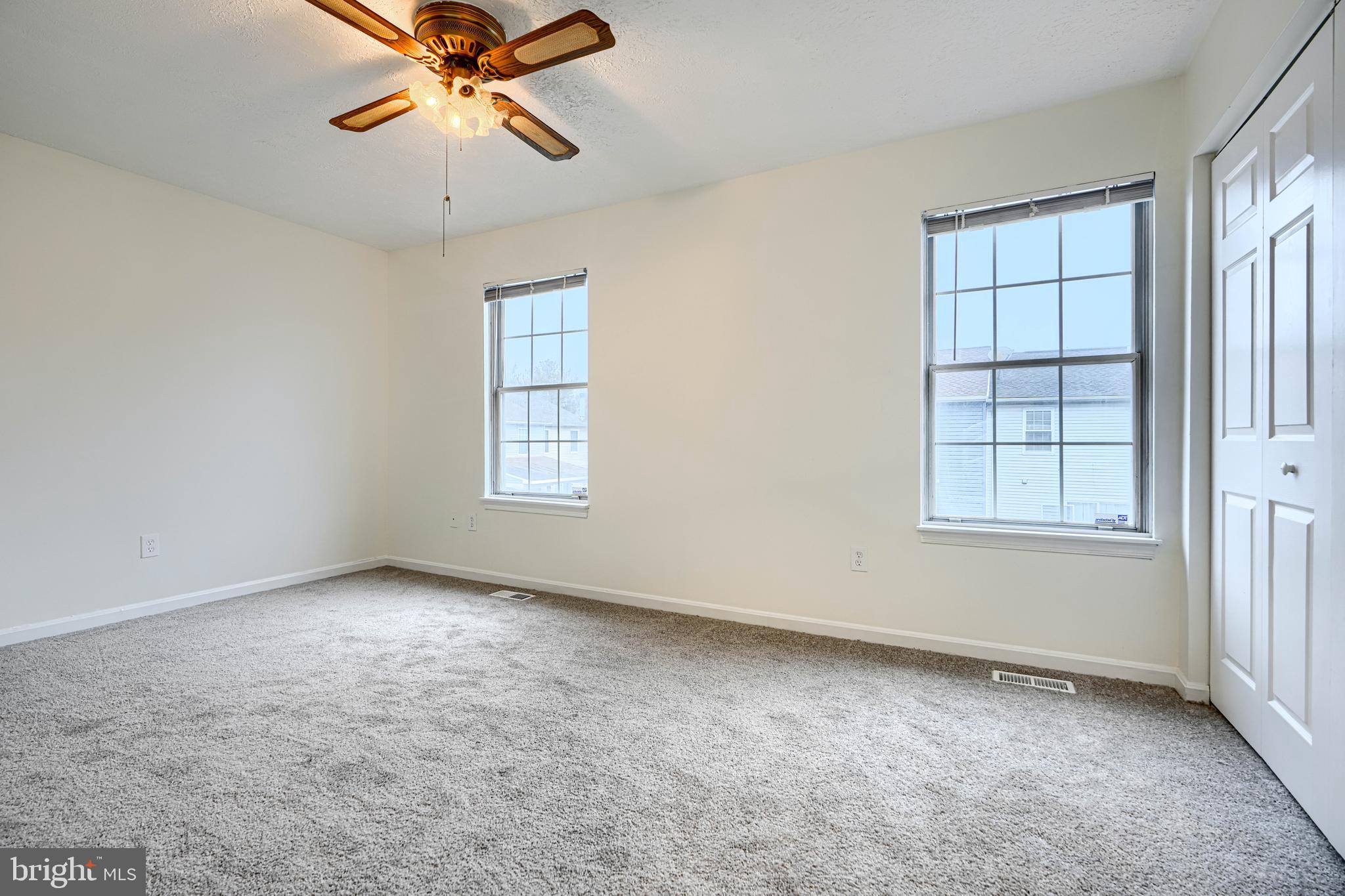 11 Offspring Court Perry Hall, MD 21128 - Photo 21 of 38 an empty room with windows and fan