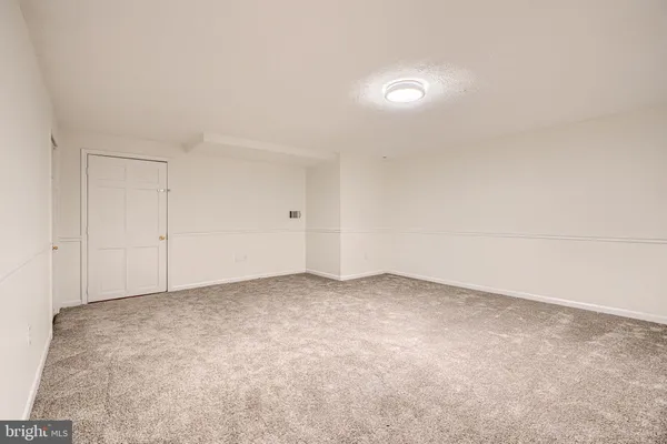 an empty room with a workbench