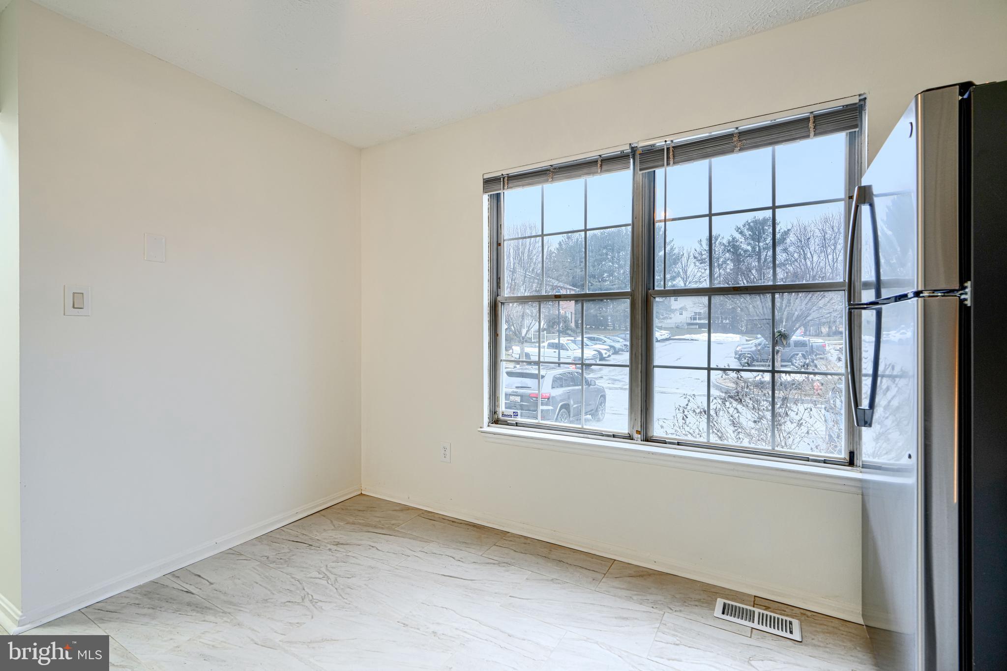 11 Offspring Court Perry Hall, MD 21128 - Photo 7 of 38 an empty room with a window