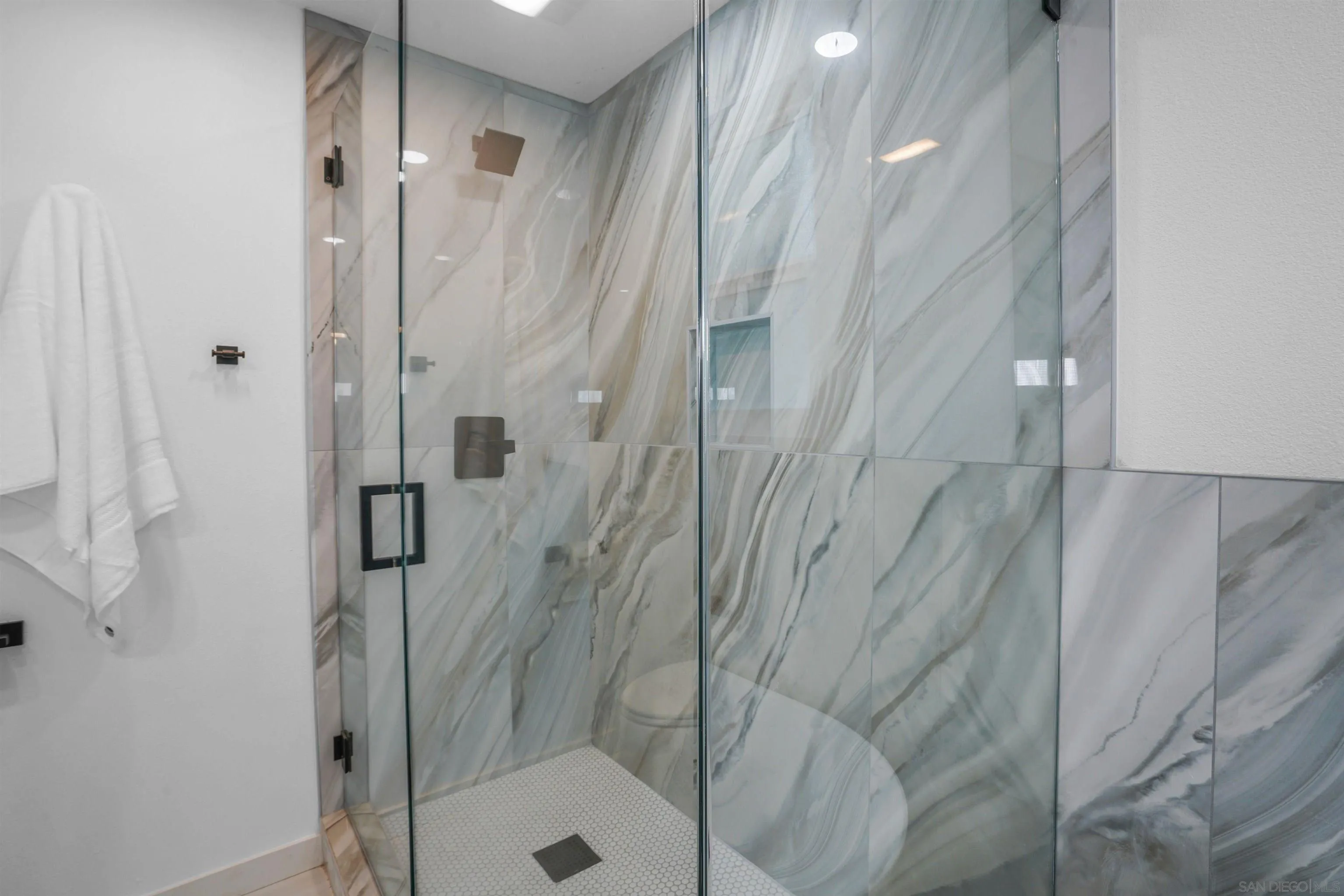 113 Solace Court Encinitas, CA 92024 - Photo 25 of 38 a bathroom with a shower