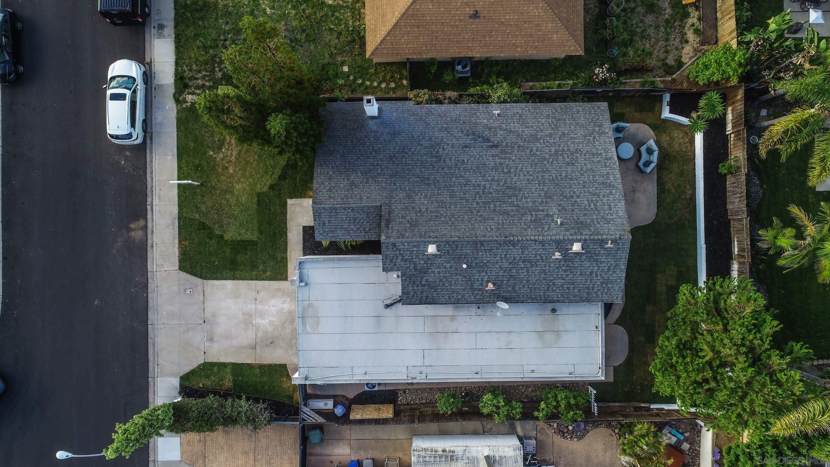 113 Solace Court Encinitas, CA 92024 - Photo 36 of 38 an aerial view of a house with a yard and large tree