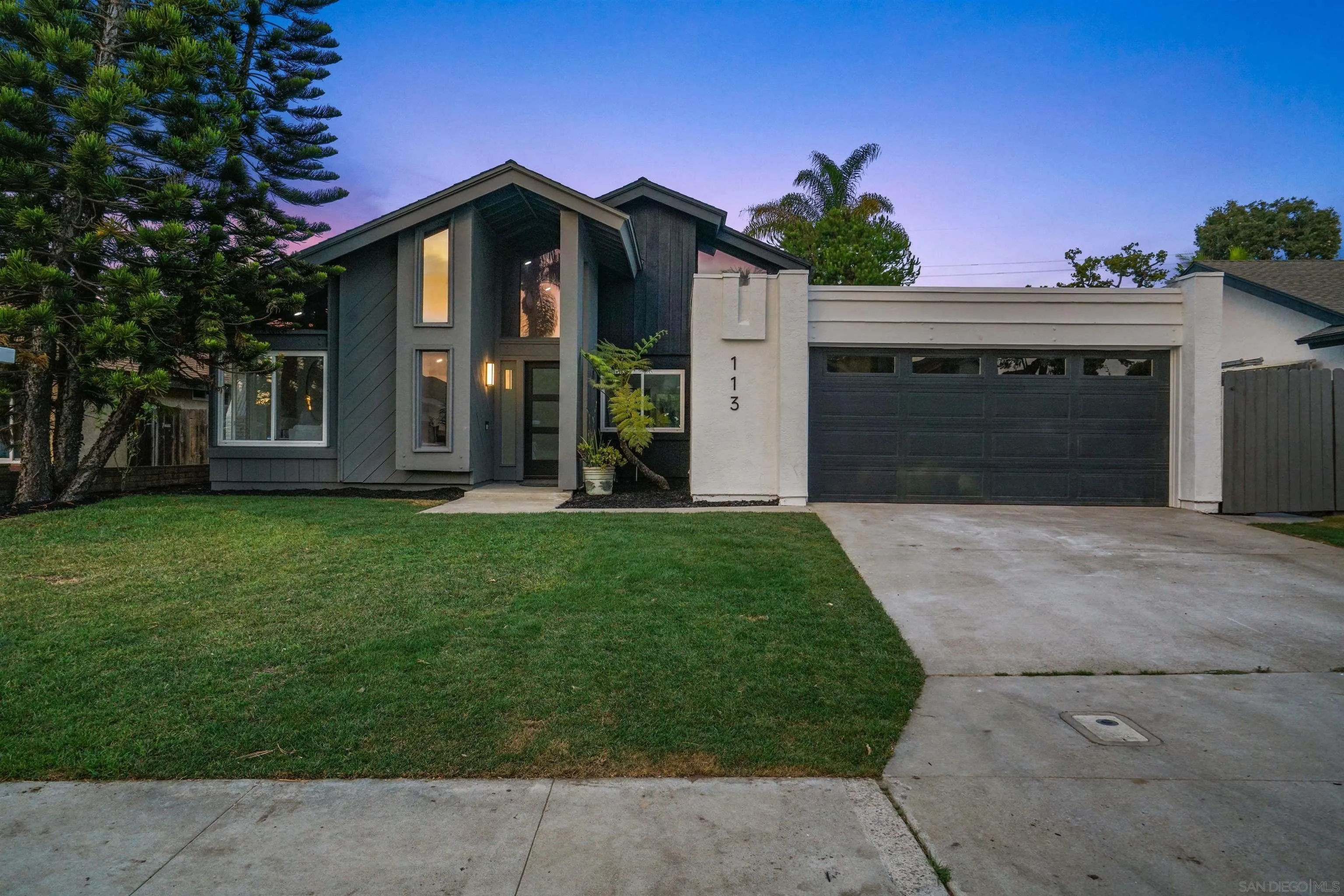 113 Solace Court Encinitas, CA 92024 - Photo 37 of 38 a front view of a house with a yard