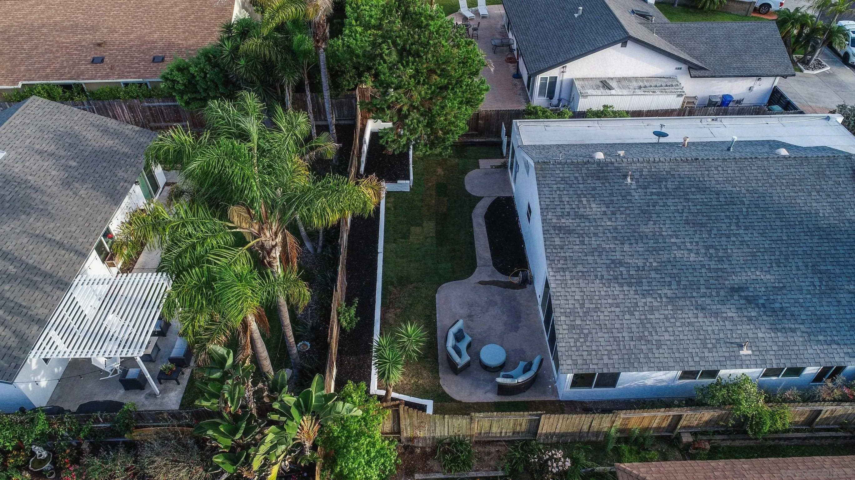113 Solace Court Encinitas, CA 92024 - Photo 38 of 38 an aerial view of a house with garden space and a patio